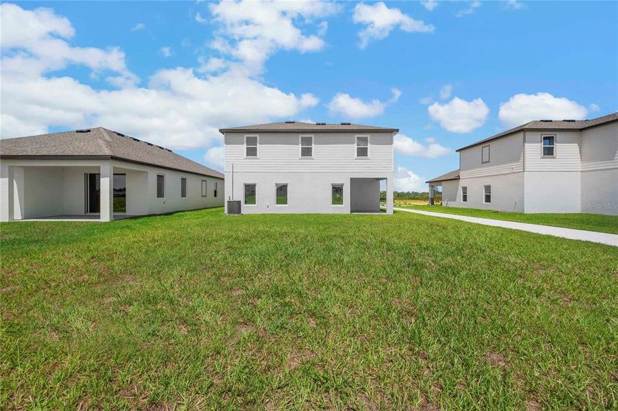Exterior details and patio area of a home in Gum Lake Preserve, Lake Alfred (Image 20).