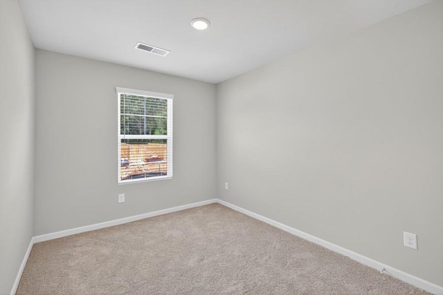 Spacious, unfurnished interior of a new home in The Reserve At Clock Tower, Douglasville (Image 27).