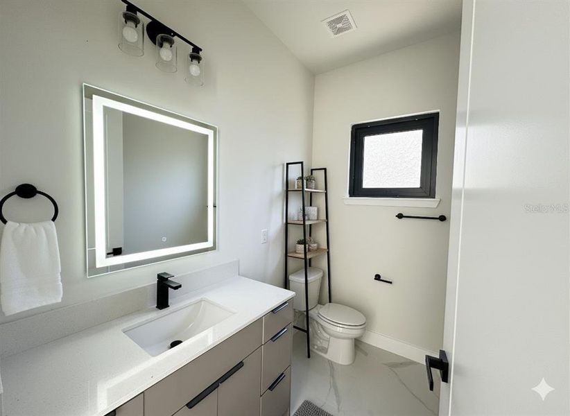 Furnished interior view inside a new home in , North Port (Image 13).