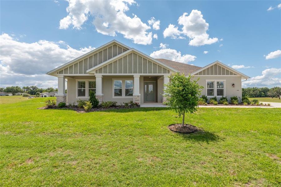 Front exterior of a new home in , Ocala, FL, highlighting curb appeal (Image 27). Front exterior of a new home in , Ocala, FL, highlighting curb appeal (Image 27).