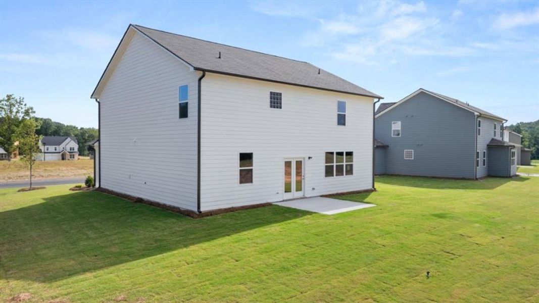 Exterior details and patio area of a home in Fairway 17 at Mirror Lake, Villa Rica (Image 3).