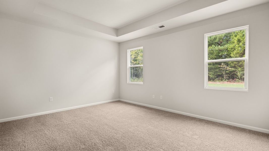 Spacious, unfurnished interior of a new home in Preserve at Dove Creek, Statham (Image 24).