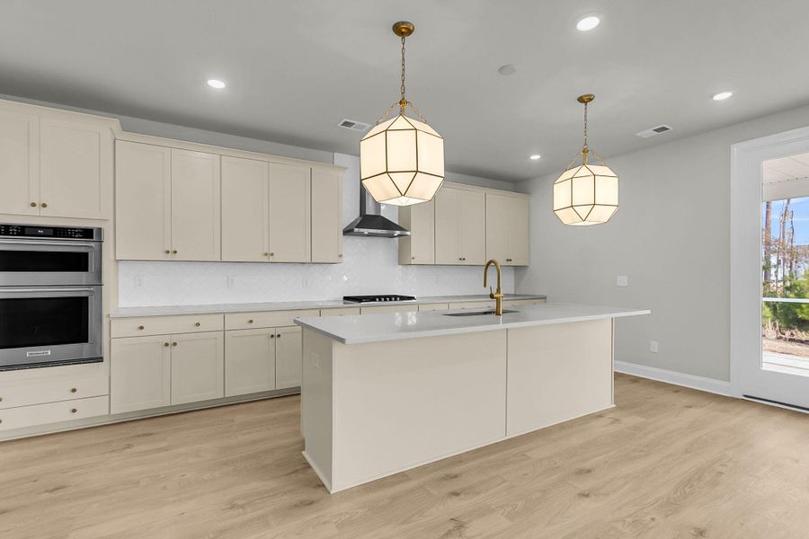 Furnished interior view inside a new home in Tidewater at Lakes of Cane Bay, Summerville (Image 7).