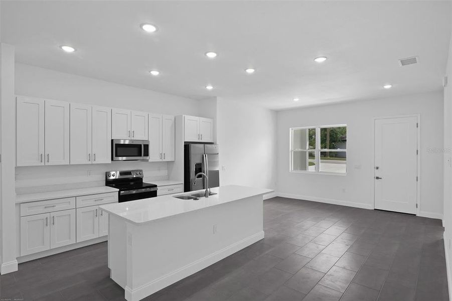 Furnished interior view inside a new home in , Dunnellon (Image 8).