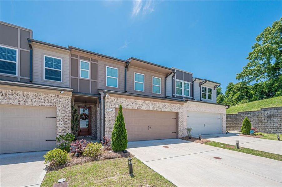 Front exterior of a new home in , Atlanta, GA, highlighting curb appeal (Image 23).