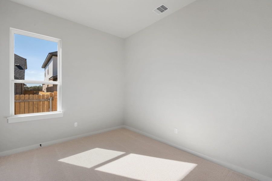 Spacious, unfurnished interior of a new home in Heritage, Dripping Springs (Image 35).