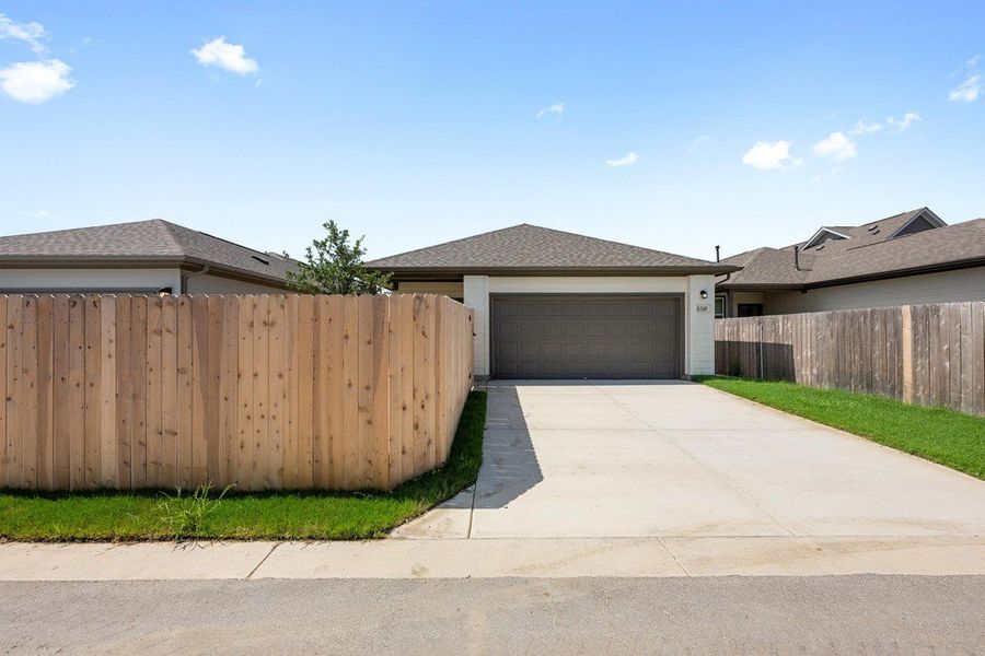 Exterior details and patio area of a home in Porter Country, Kyle (Image 11).