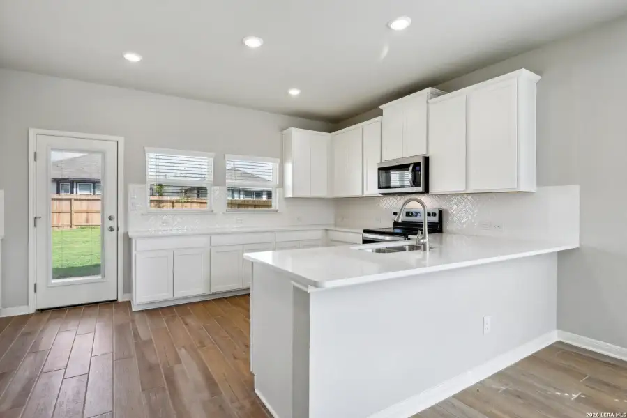 Furnished interior view inside a new home in Kallison Ranch, San Antonio (Image 4).