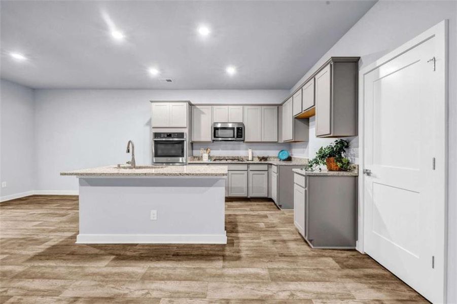 Furnished interior view inside a new home in Palmetto Oaks Phase III, Palmetto (Image 8). Furnished interior view inside a new home in Palmetto Oaks Phase III, Palmetto (Image 8).