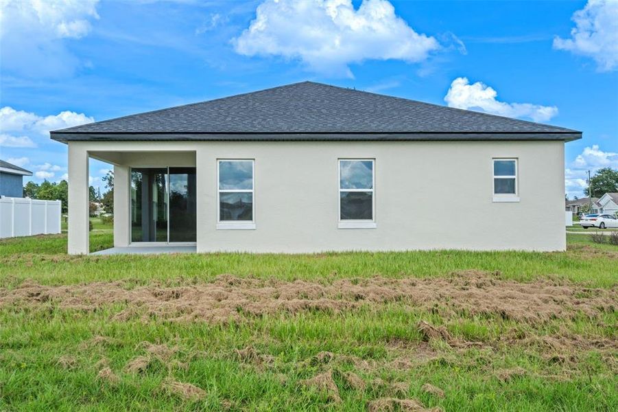 Front exterior of a new home in , Ocala, FL, highlighting curb appeal (Image 18).