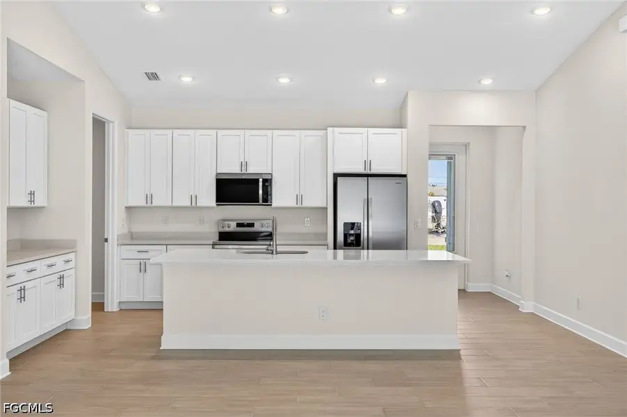 Furnished interior view inside a new home in Cape Coral, Cape Coral (Image 12).