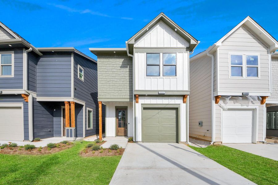Front exterior of a new home in , Houston, TX, highlighting curb appeal (Image 31).