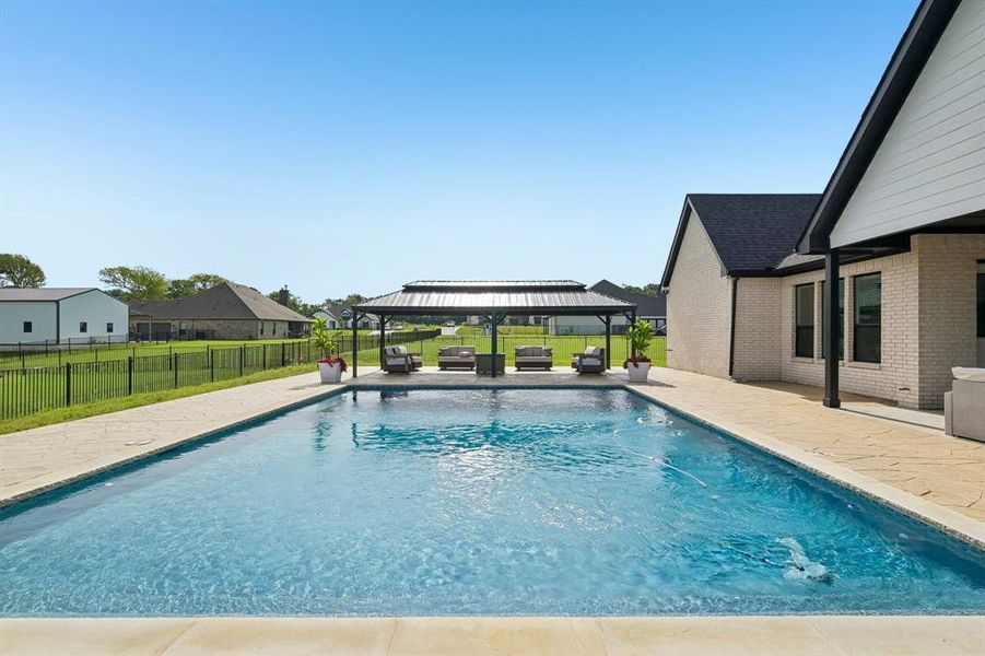Exterior details and patio area of a home in King Crossing Estates, Van Alstyne (Image 21). Exterior details and patio area of a home in King Crossing Estates, Van Alstyne (Image 21).