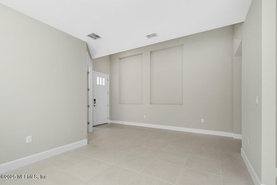 Spacious, unfurnished interior of a new home in Colbert Landings, Palm Coast (Image 37).