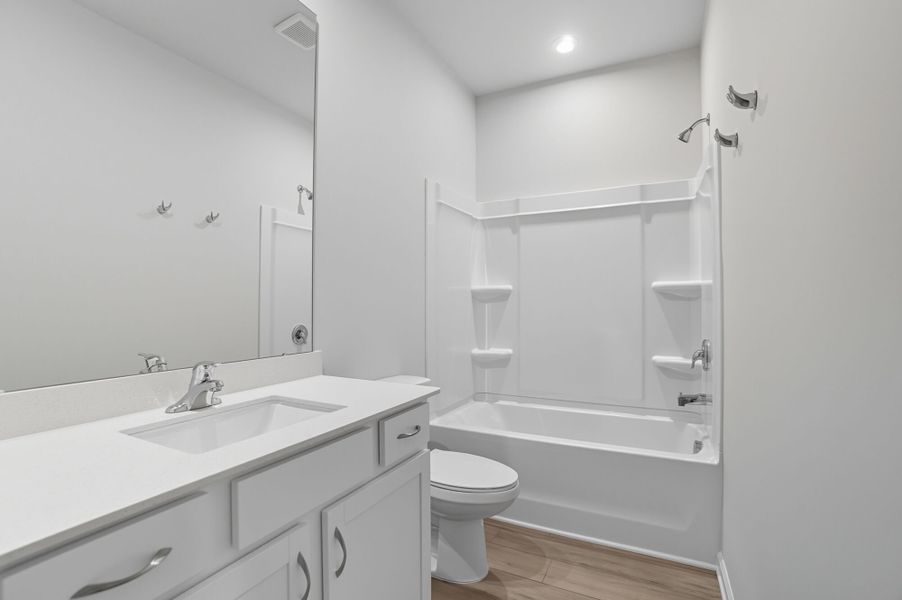 Furnished interior view inside a new home in Waxhaw Landing, Monroe (Image 9).
