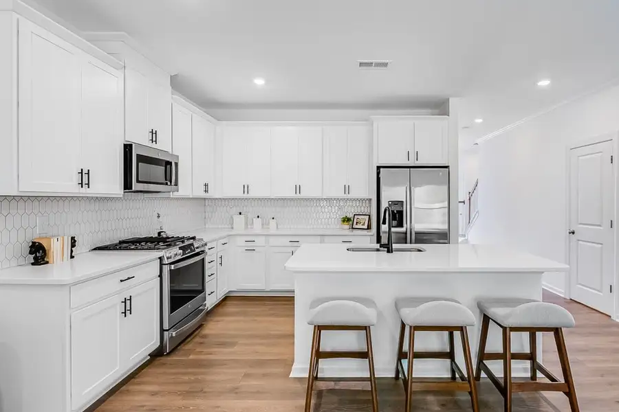 Representative furnished interior of a home built from the Magnolia by Taylor Morrison in Forestville Station, Wake Forest (Image 11).