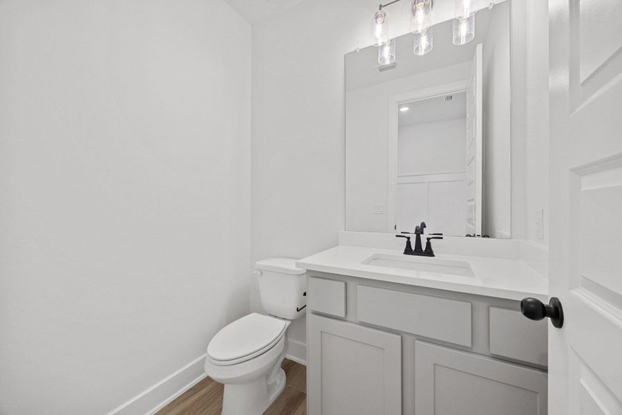Furnished interior view inside a new home in Flora, Hutto (Image 13).