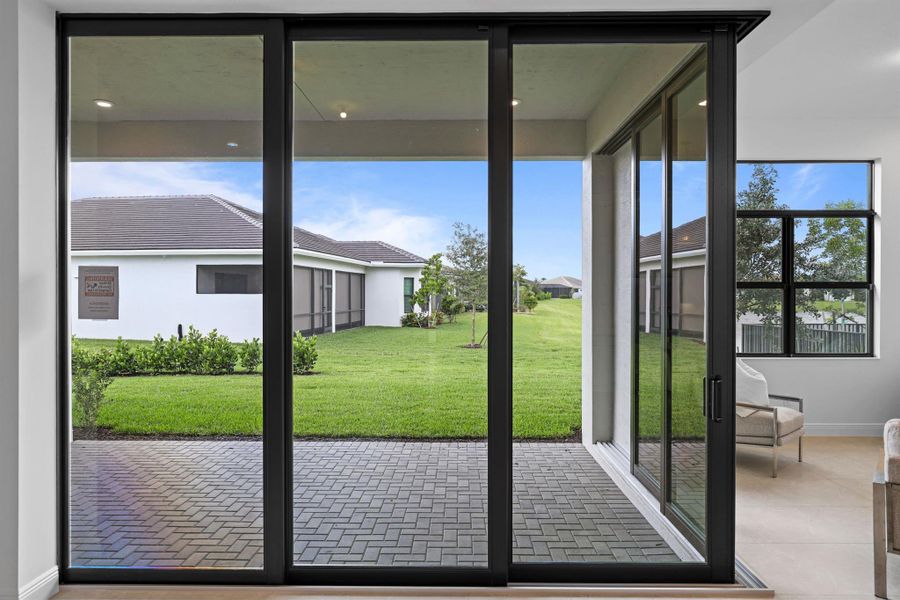 Exterior details and patio area of a home in Cresswind Palm Beach at Westlake, The Acreage (Image 31).