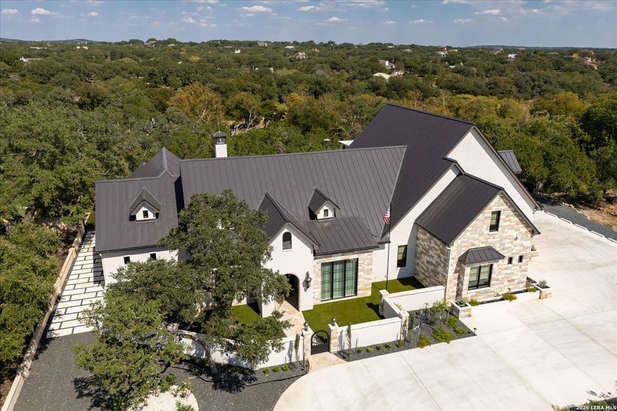 Front exterior of a new home in , Fair Oaks Ranch, TX, highlighting curb appeal (Image 23).