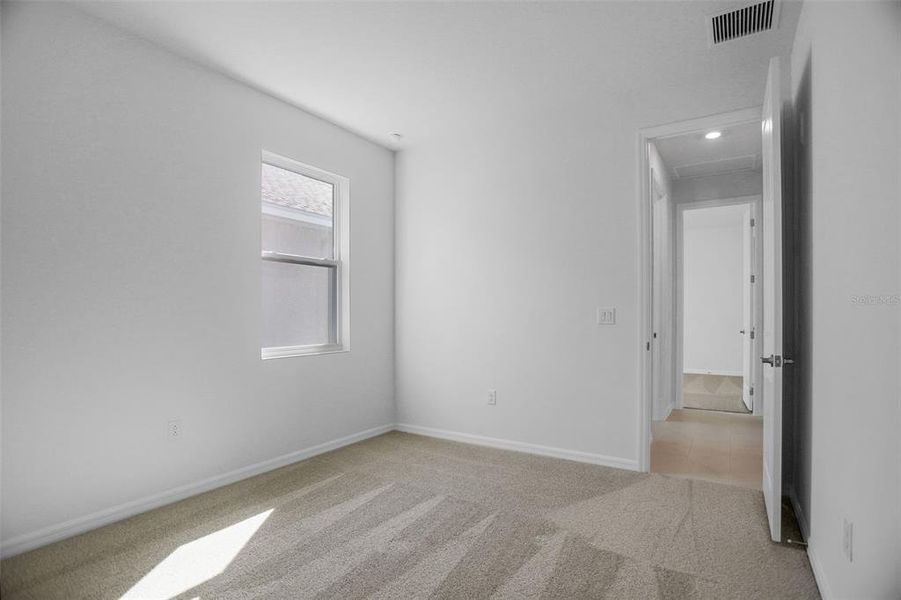 Spacious, unfurnished interior of a new home in Angeline, Land O' Lakes (Image 29).