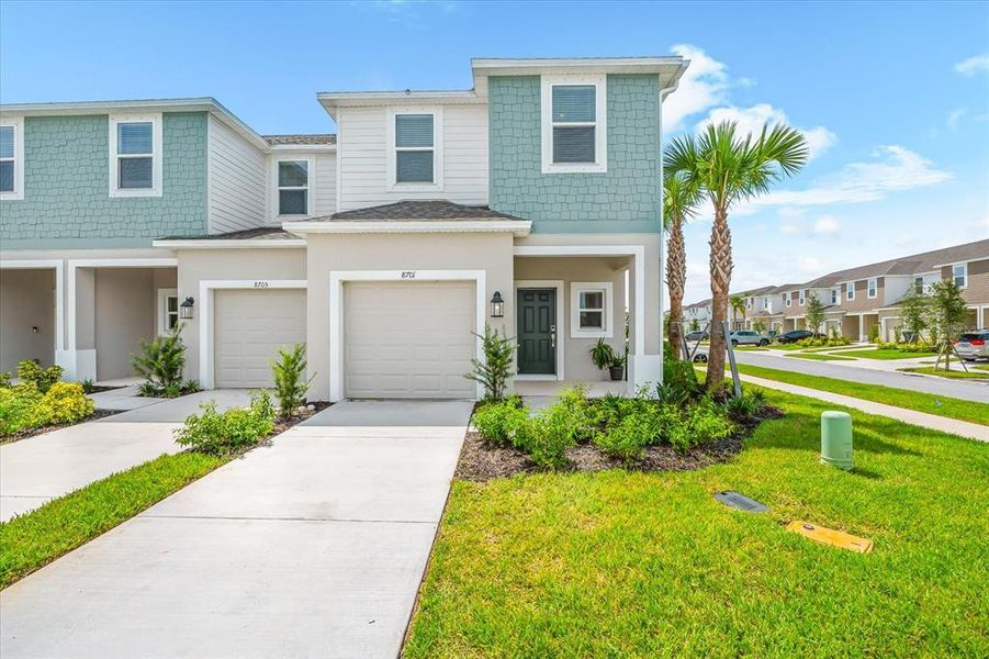 Front exterior of a new home in , Sarasota, FL, highlighting curb appeal (Image 26). Front exterior of a new home in , Sarasota, FL, highlighting curb appeal (Image 26).