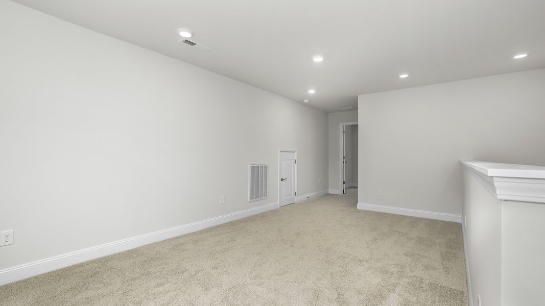 Spacious, unfurnished interior of a new home in The Villas at Kinsley, Jamestown (Image 16).