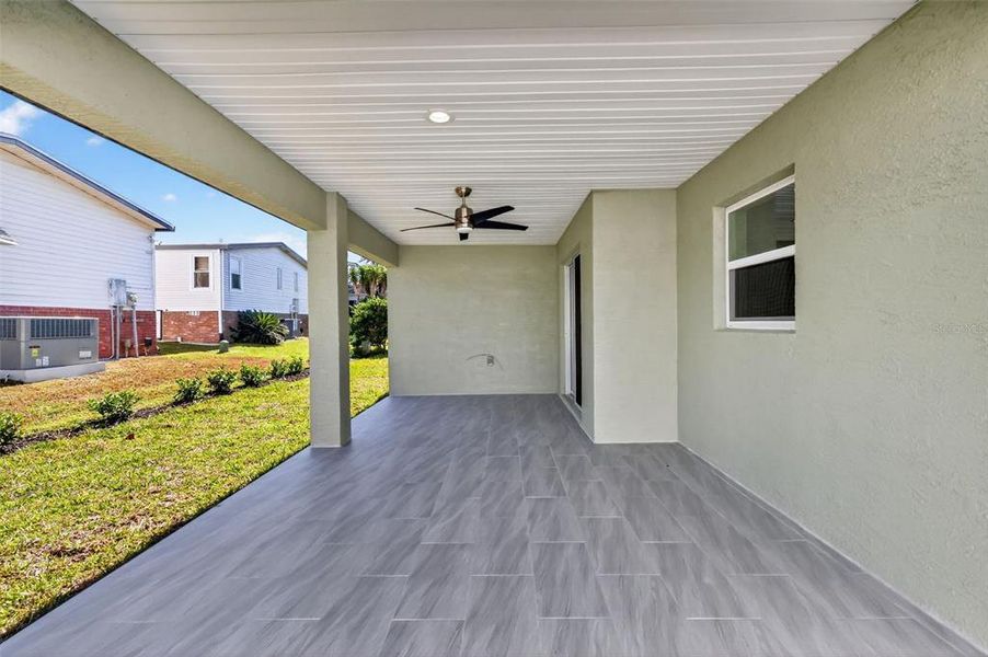 Exterior details and patio area of a home in , The Villages (Image 26). Exterior details and patio area of a home in , The Villages (Image 26).