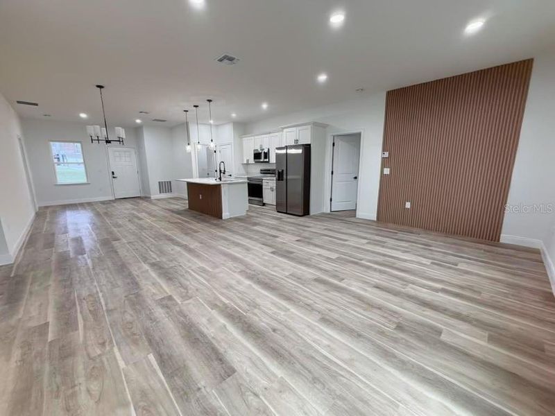 Spacious, unfurnished interior of a new home in , Port Charlotte (Image 13).
