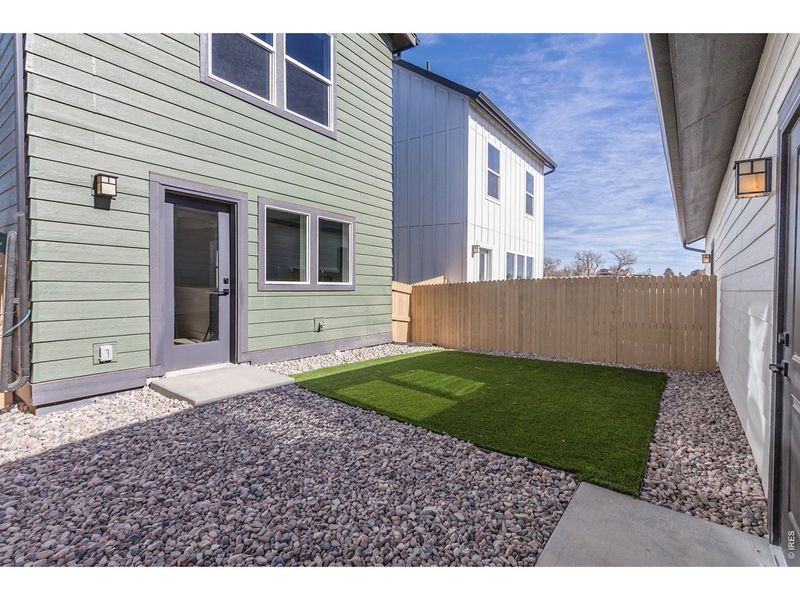 Exterior details and patio area of a home in Prairie Song Cottages, Windsor (Image 23).