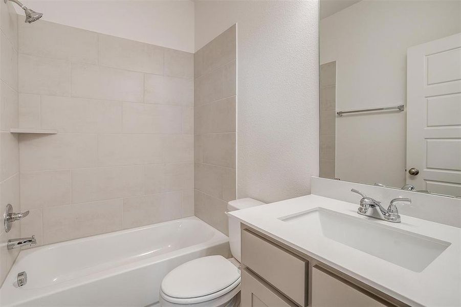 Full bathroom located downstairs right off the secondary bedroom