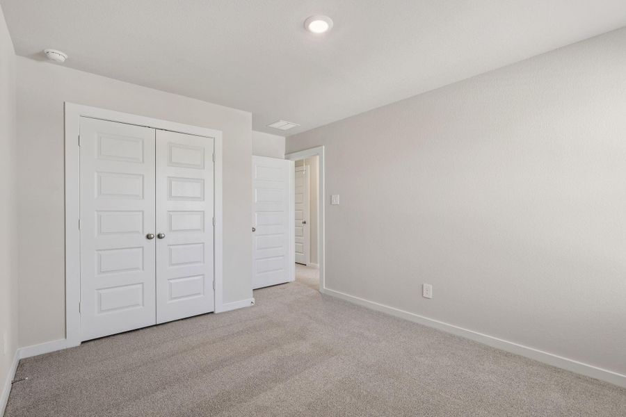 Spacious, unfurnished interior of a new home in Landing Meadows - Premier Series, New Caney (Image 27). Spacious, unfurnished interior of a new home in Landing Meadows - Premier Series, New Caney (Image 27).