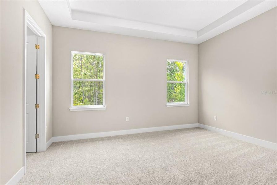 Spacious, unfurnished interior of a new home in Gray Hawk at Hole Two, Daytona Beach (Image 39).