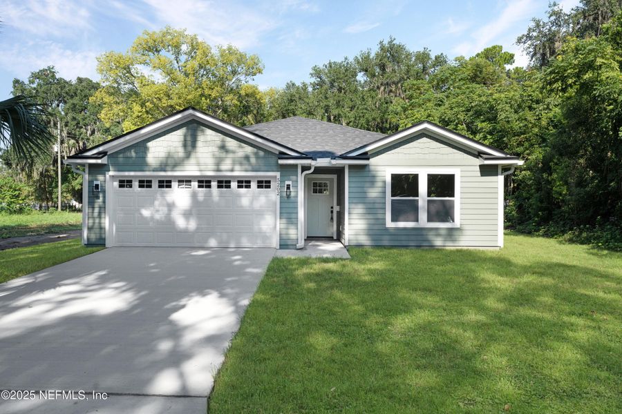Front exterior of a new home in , Jacksonville, FL, highlighting curb appeal (Image 17).