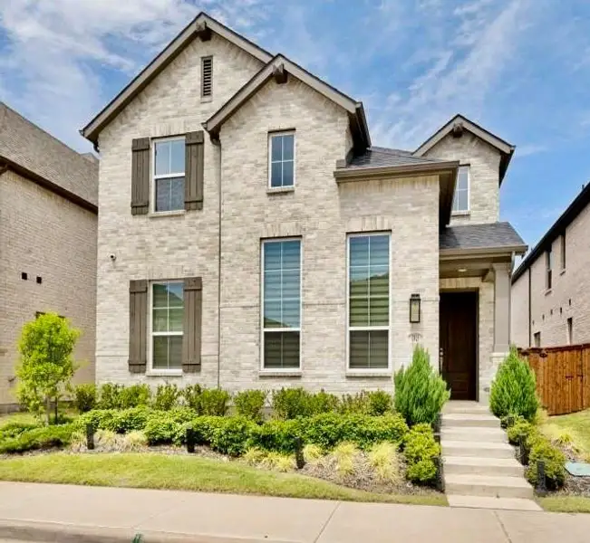 Front exterior of a new home in , Celina, TX, highlighting curb appeal (Image 1). Front exterior of a new home in , Celina, TX, highlighting curb appeal (Image 1).