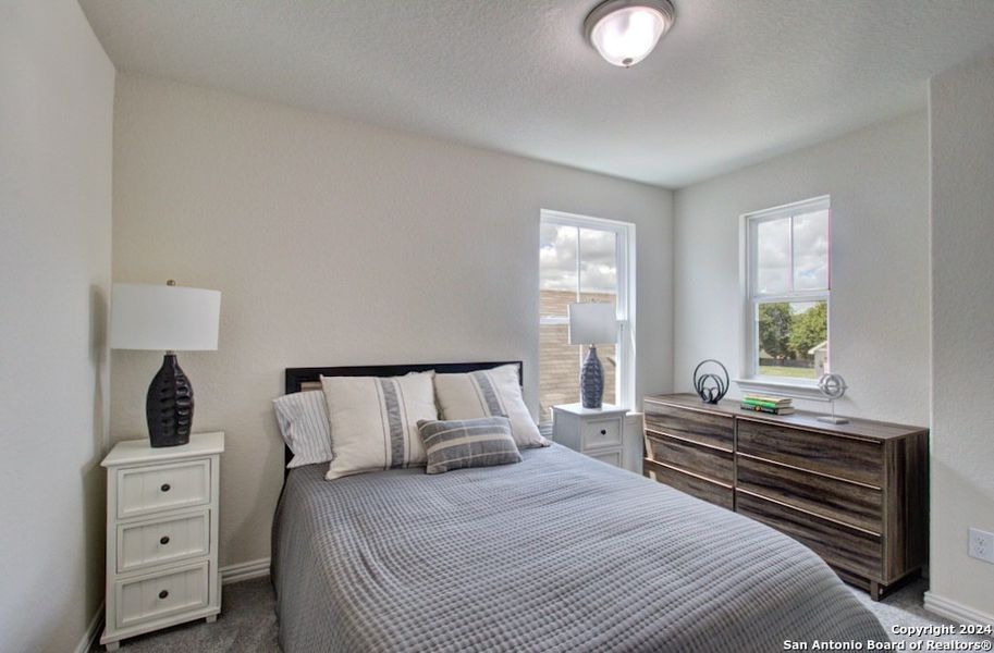 Furnished interior view inside a new home in Casinas at Gruene, New Braunfels (Image 9).