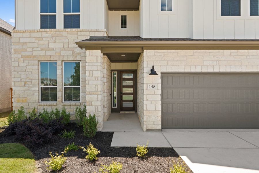 Exterior details and patio area of a home in Lariat, Liberty Hill (Image 3).