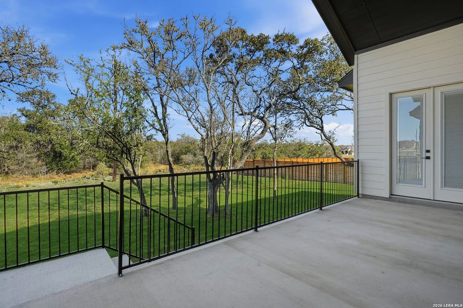 Exterior details and patio area of a home in Potranco Oaks, Castroville (Image 3).