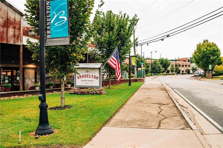 Front exterior of a new home in Rosewood Lake Estates, Hoschton, GA, highlighting curb appeal (Image 50).