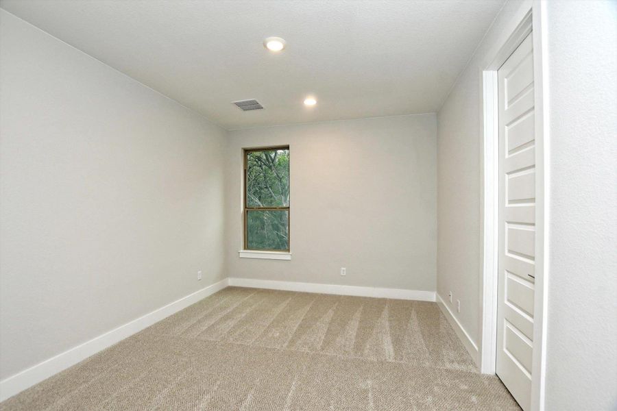 Bedroom with recessed lighting, light carpet, baseboards, and visible vents