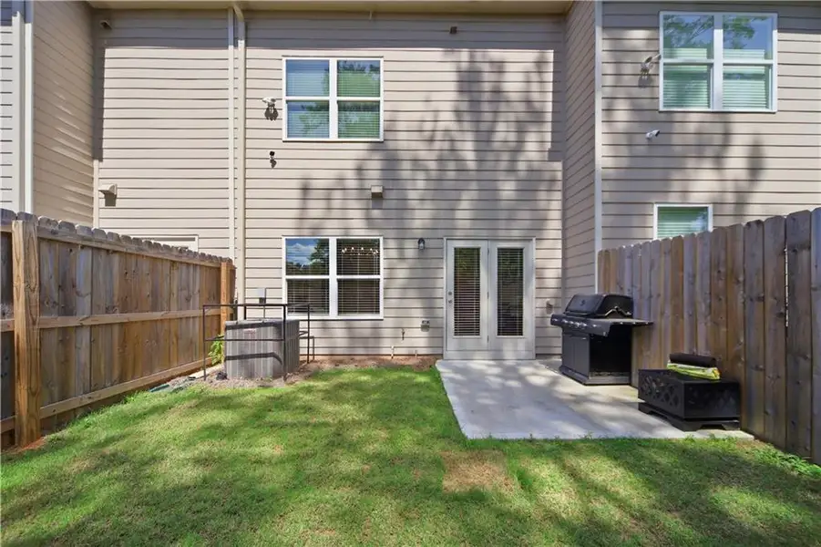 Exterior details and patio area of a home in , Lithonia (Image 4). Exterior details and patio area of a home in , Lithonia (Image 4).