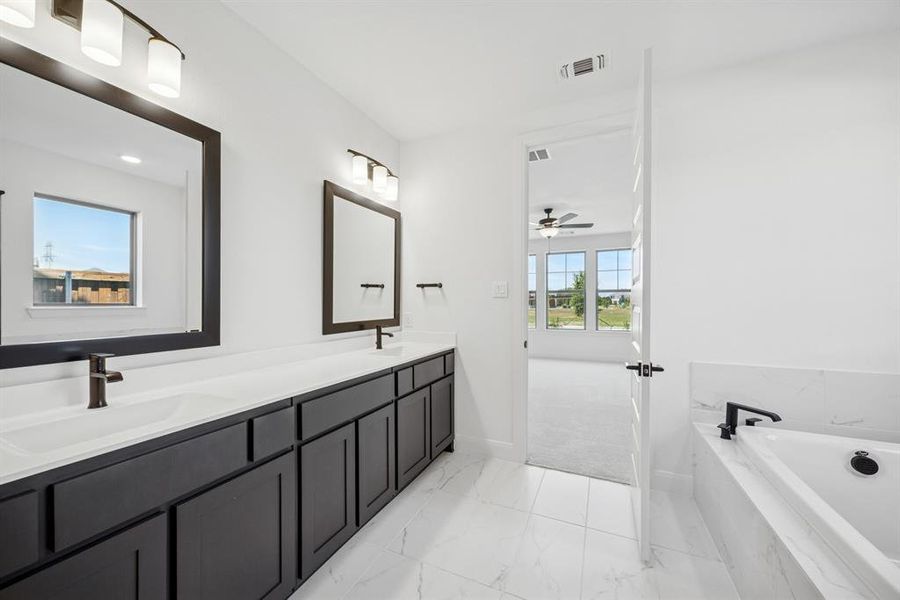 Furnished interior view inside a new home in Karis - Village Series, Crowley (Image 12). Furnished interior view inside a new home in Karis - Village Series, Crowley (Image 12).