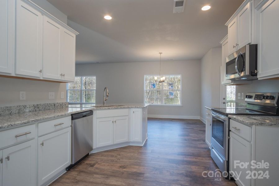 Kitchen. Representative Photograph - Colors/Options may vary.