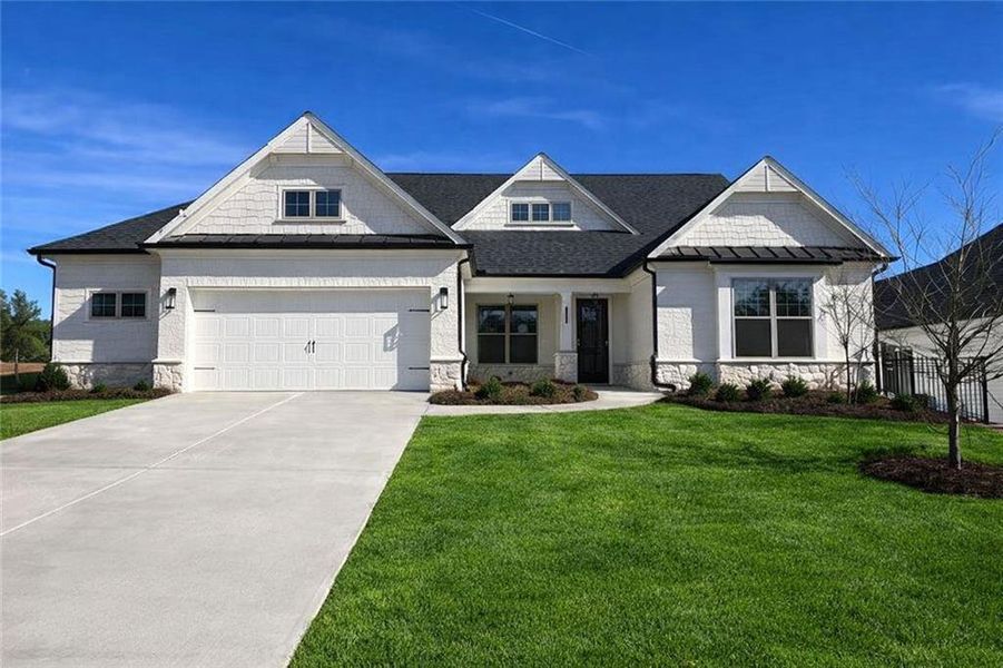 Front exterior of a new home in Soleil Belmont Park, Canton, GA, highlighting curb appeal (Image 1). Front exterior of a new home in Soleil Belmont Park, Canton, GA, highlighting curb appeal (Image 1).