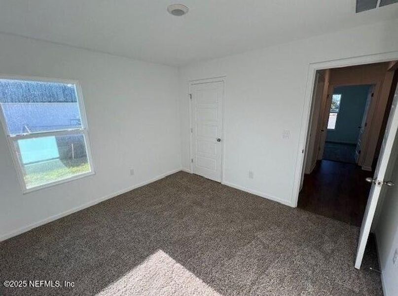Spacious, unfurnished interior of a new home in Sawmill Branch, Palm Coast (Image 21). Spacious, unfurnished interior of a new home in Sawmill Branch, Palm Coast (Image 21).