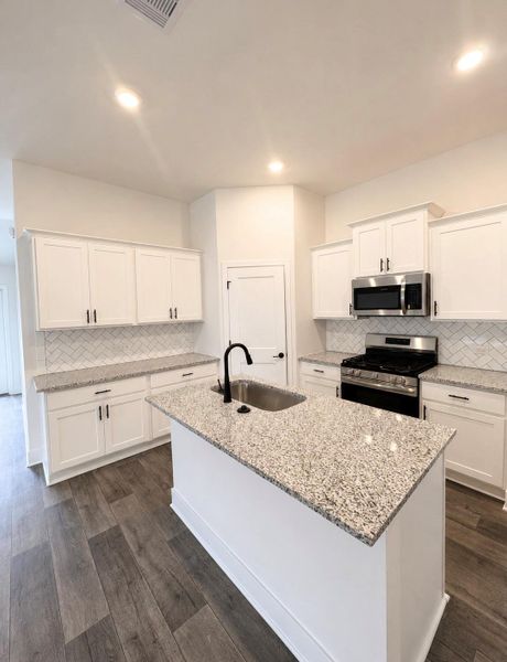 Furnished interior view inside a new home in River Ranch Trails, Dayton (Image 5).