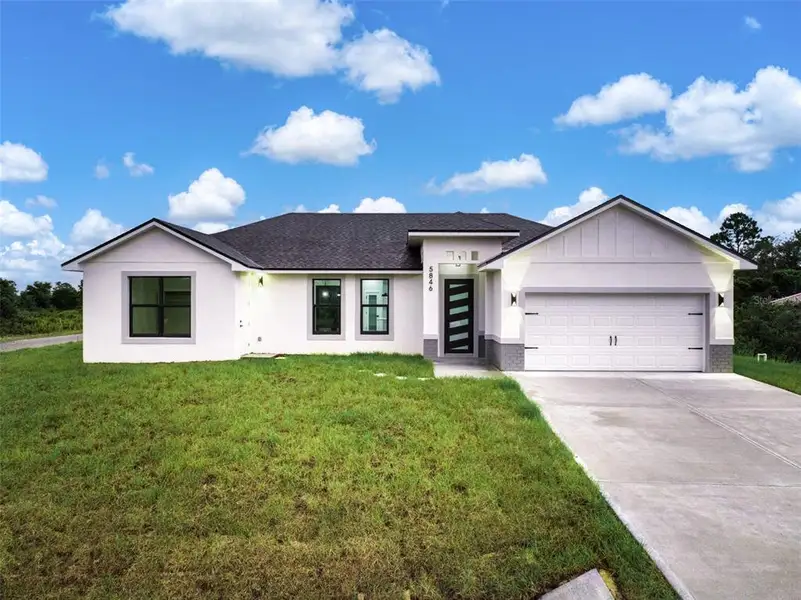 Front exterior of a new home in , Sebring, FL, highlighting curb appeal (Image 1). Front exterior of a new home in , Sebring, FL, highlighting curb appeal (Image 1).