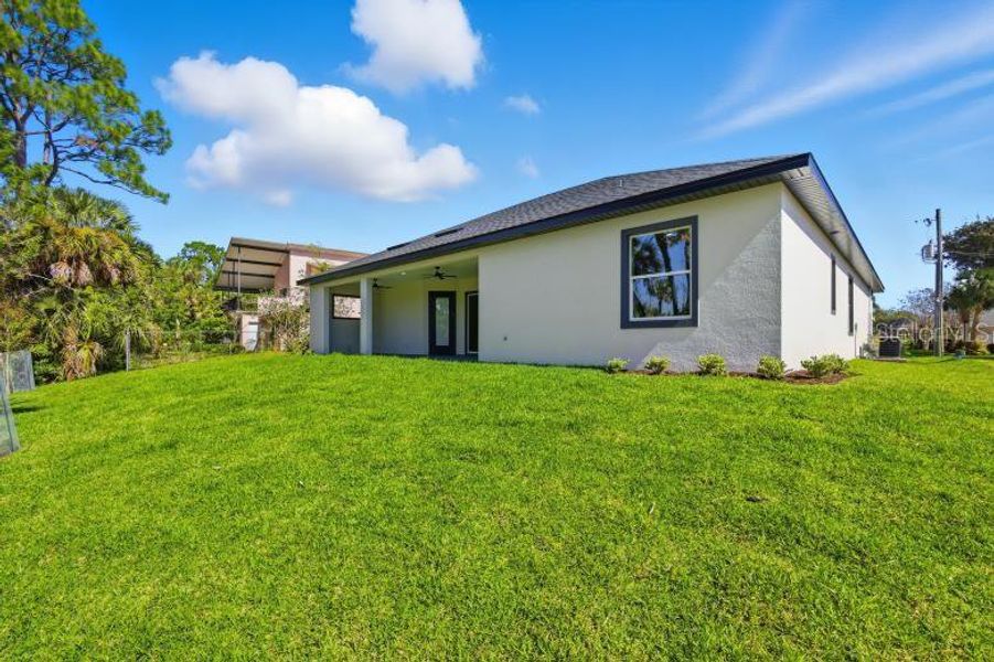 Exterior details and patio area of a home in , Palm Coast (Image 31).