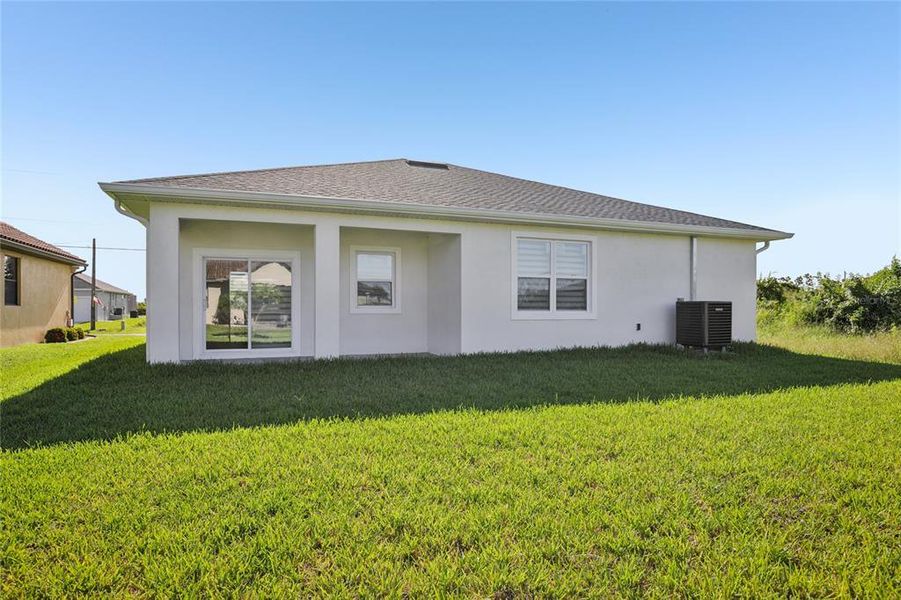 Exterior details and patio area of a home in , Rotonda West (Image 24).