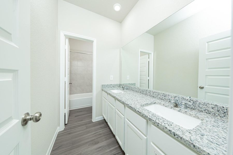 Furnished interior view inside a new home in Ridgeland Hills, Willis (Image 7).