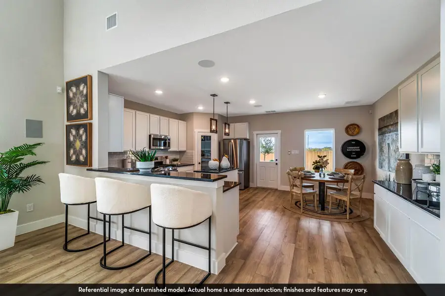 Furnished interior view inside a new home in Caney Mills, Conroe (Image 13).